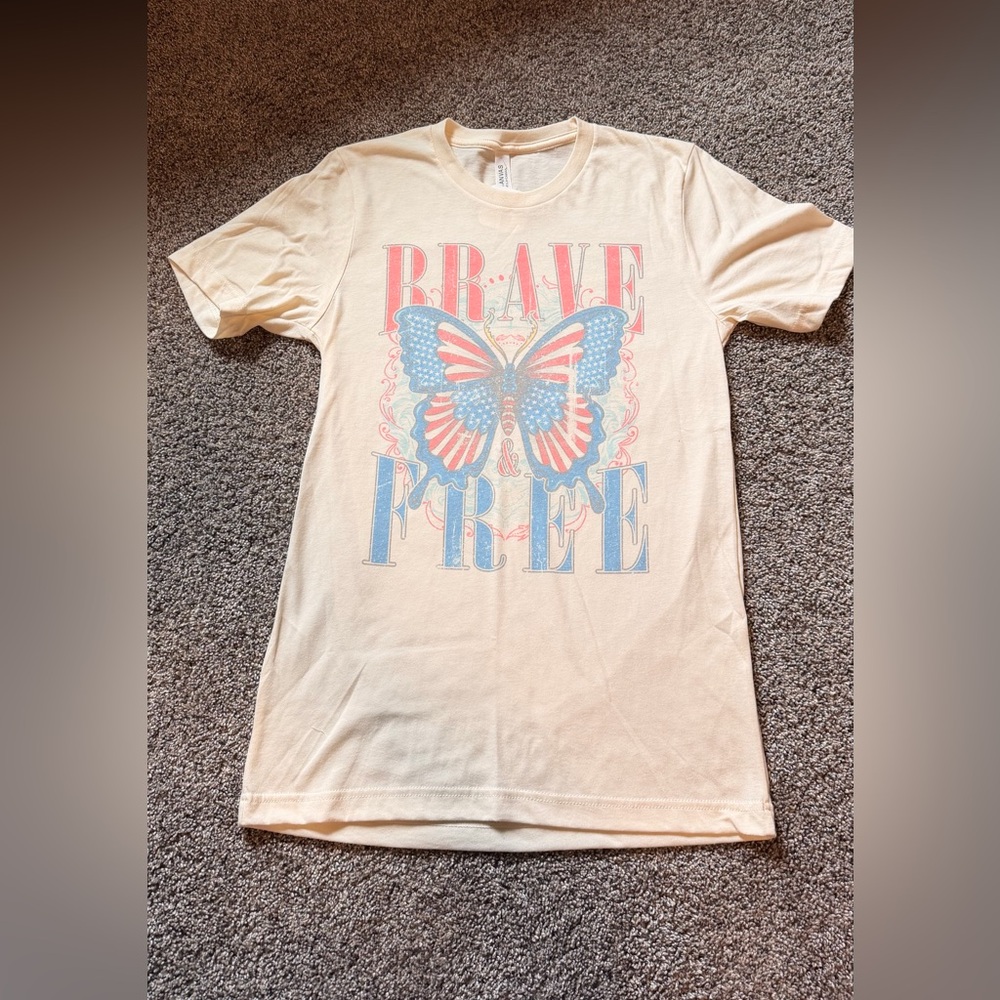 NWT - Brave & Free T-Shirt - Cream with Blue and Red Flag Butterfly